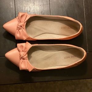 Nine West salmon pink bow shoes.